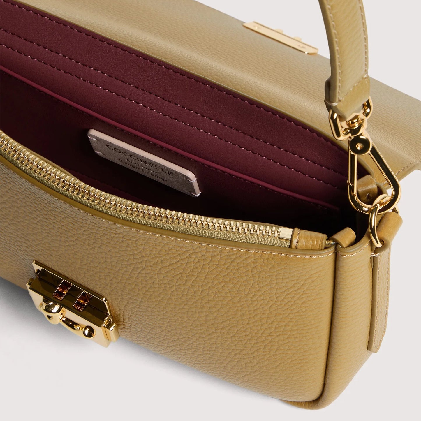 Оливкова італійська шкіряна жіноча сумка Coccinelle C-Me Lock Medium E1 U4K 12 02 01 G43