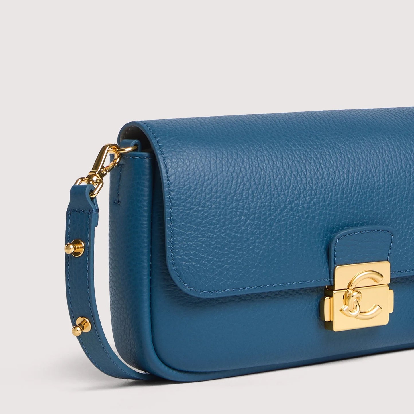 Бірюзова італійська шкіряна жіноча сумка Coccinelle C-Me Lock Mini E5 U4K 52 01 01 B27