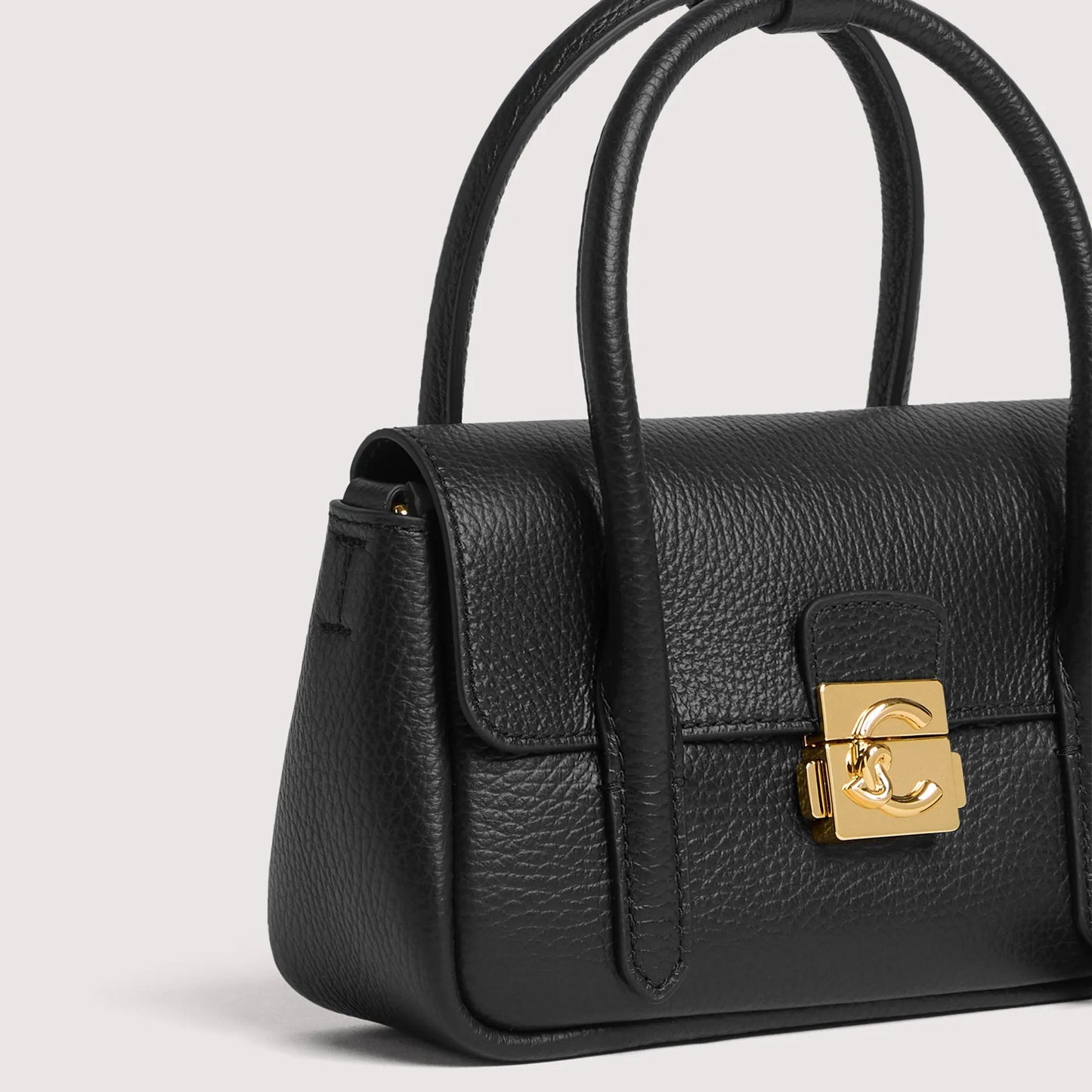 Чорна італійська шкіряна жіноча сумка Coccinelle C-Me Lock E5 U4K 58 01 01 001