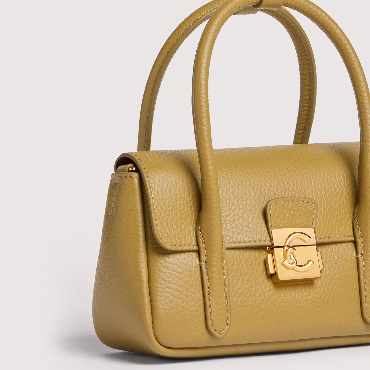 Оливкова італійська шкіряна жіноча сумка Coccinelle C-Me Lock E5 U4K 58 01 01 G43