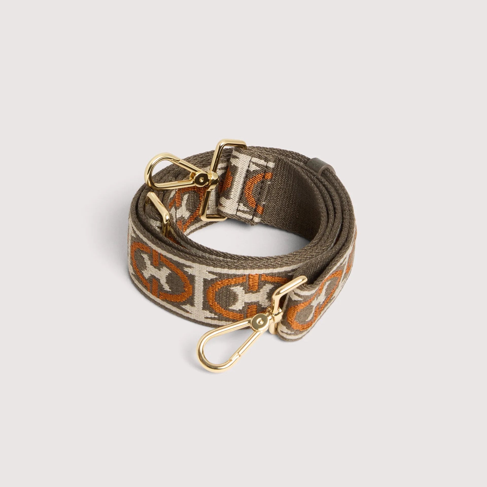Італійський жіночий ремінь для сумки Coccinelle Monogram E3 N24 68 25 23 545 кольору тауп/помаранчевий