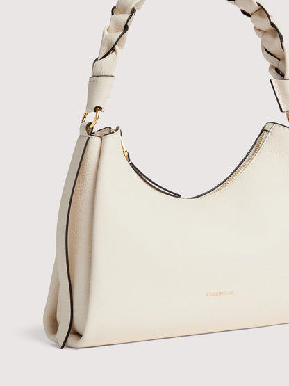 Біла італійська шкіряна жіноча сумка Coccinelle Boheme Small Grana Double E1 M50 13 03 01 685