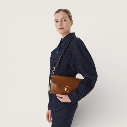 Коричнева італійська шкіряна жіноча сумка Coccinelle C-Me Medium Calf E1 SSK 12 03 01 W11