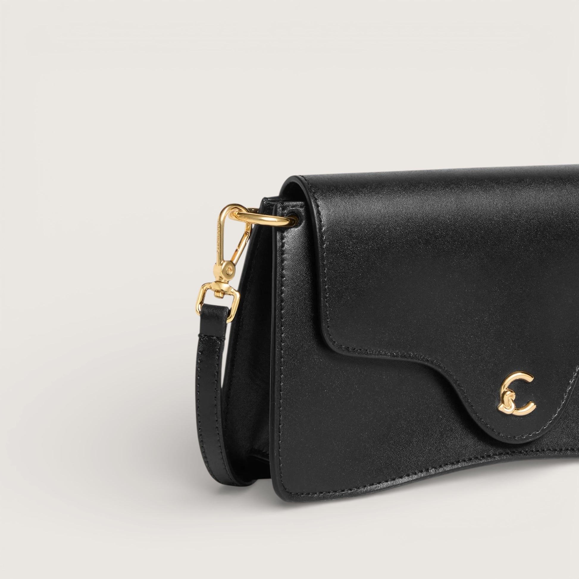 Чорна італійська шкіряна жіноча сумка Coccinelle C-Me Mini Calf E5 SSK 27 01 01 001