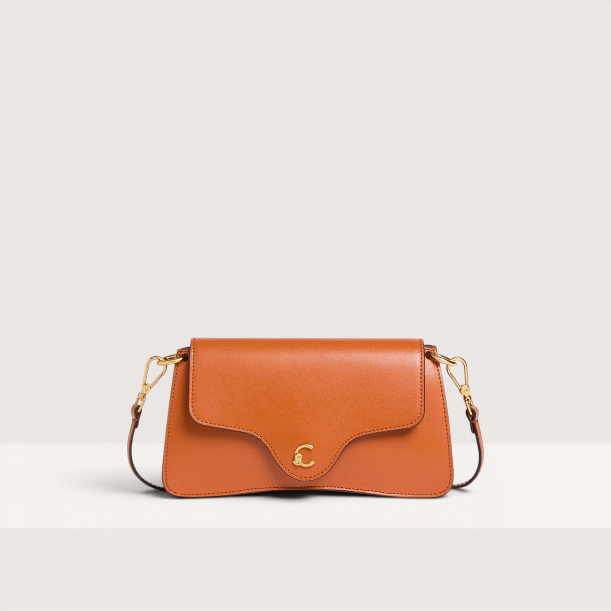 Руда італійська шкіряна жіноча сумка Coccinelle C-Me Mini Calf E5 SSK 27 01 01 R41