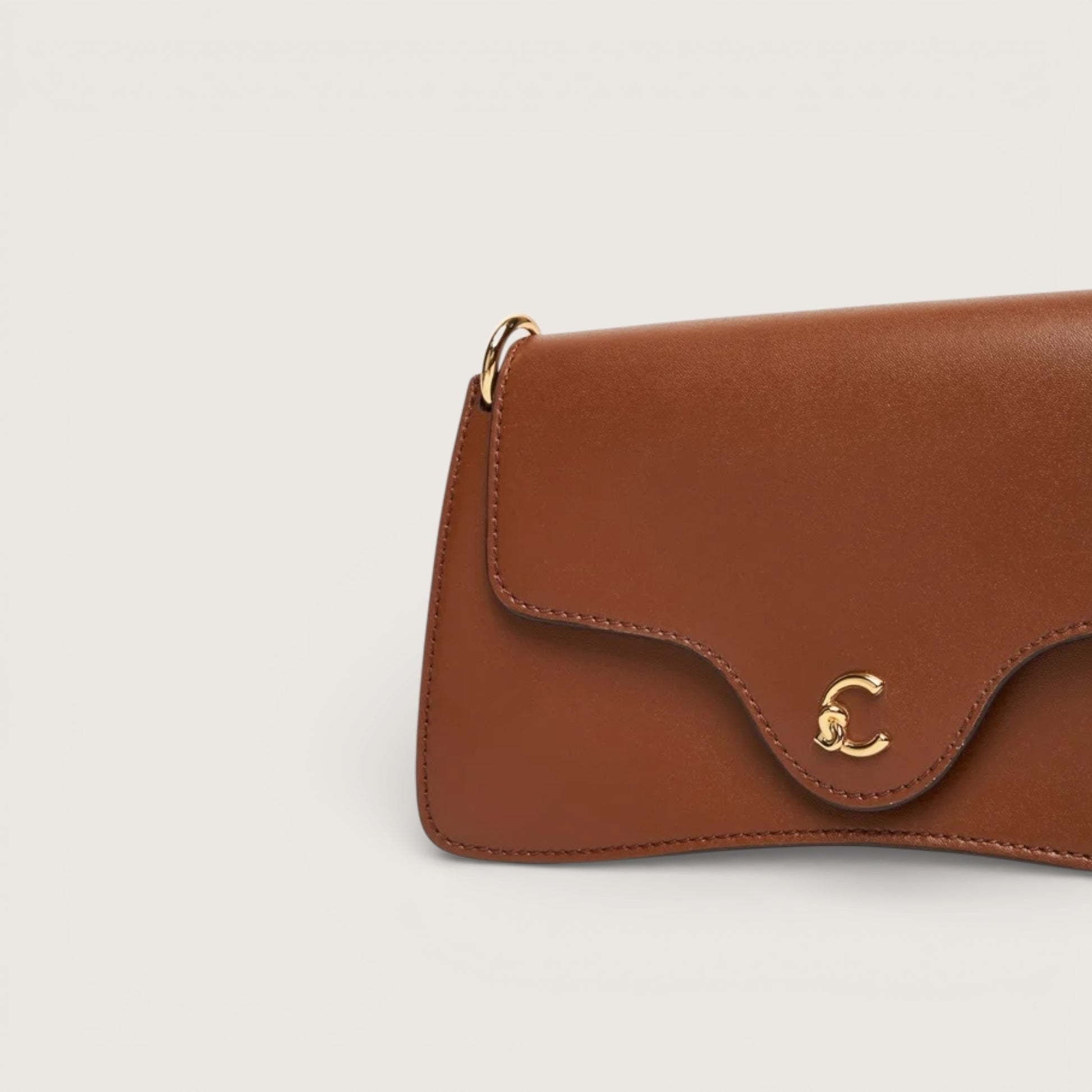 Коричнева італійська шкіряна жіноча сумка Coccinelle C-Me Mini Calf E5 SSK 27 01 01 W11