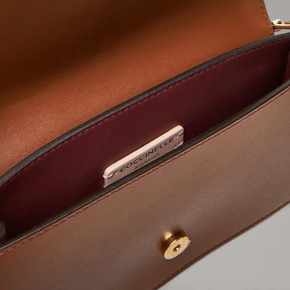Коричнева італійська шкіряна жіноча сумка Coccinelle C-Me Mini Calf E5 SSK 27 01 01 W11