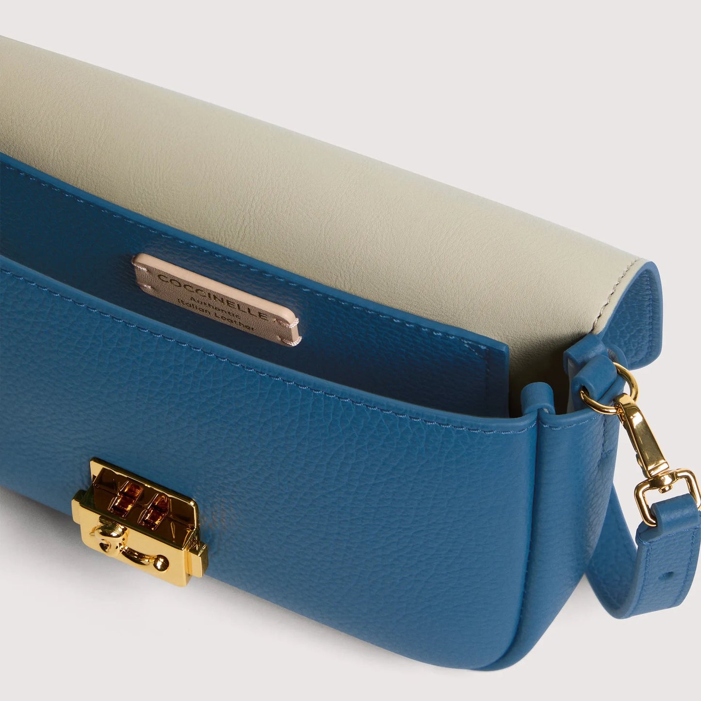 Бірюзова італійська шкіряна жіноча сумка Coccinelle C-Me Lock Mini E5 U4K 52 01 01 B27