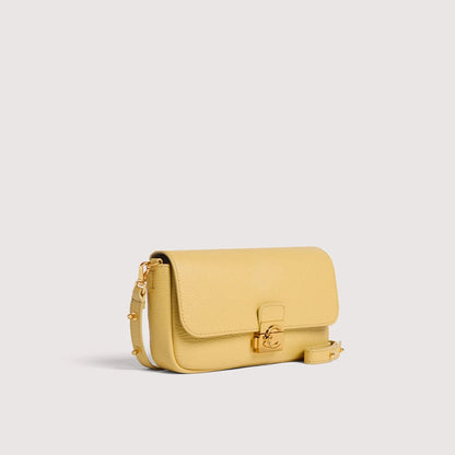 Лимонна італійська шкіряна жіноча сумка Coccinelle C-Me Lock Mini Lock E5 U4K 52 01 01 J06