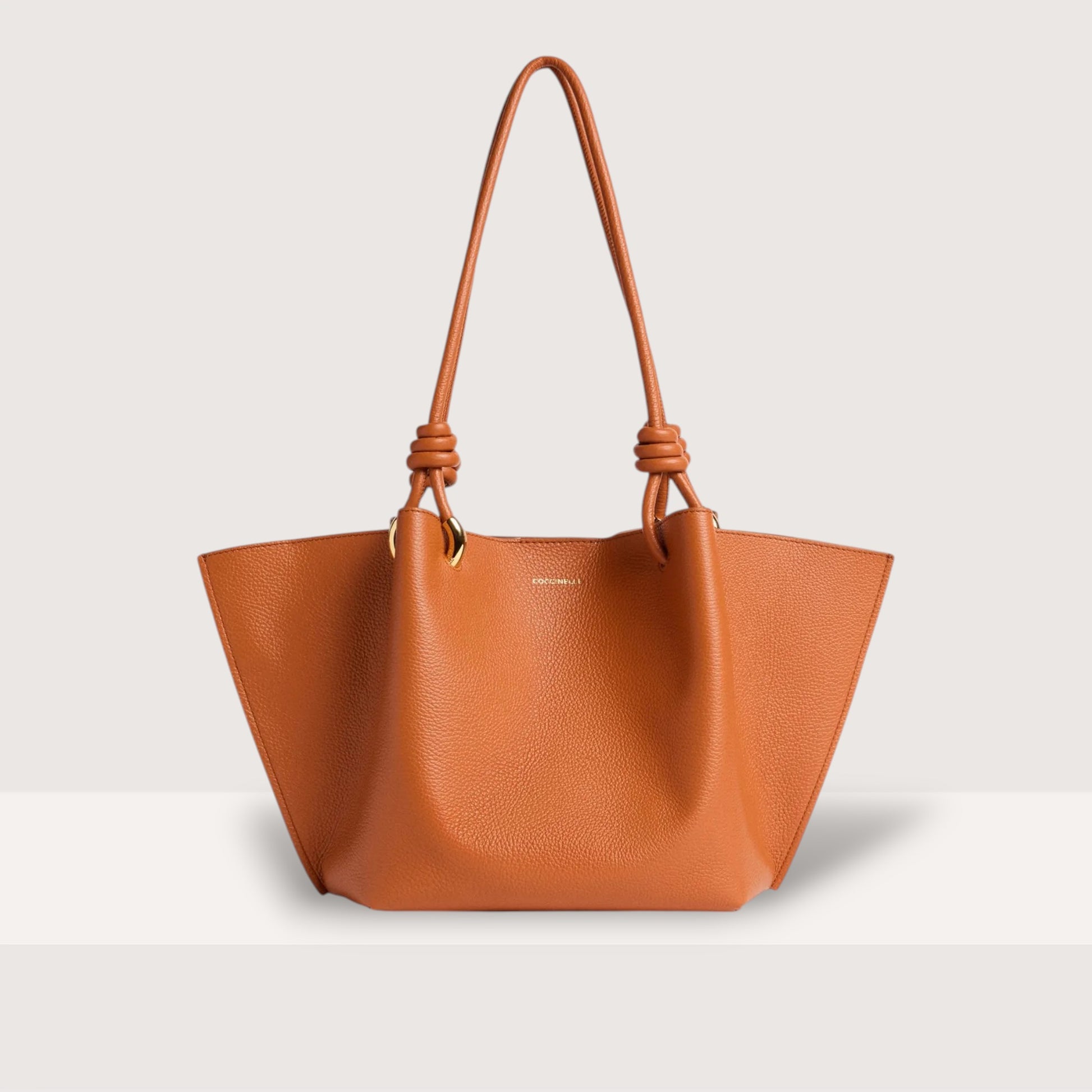 Руда італійська шкіряна жіноча сумка Coccinelle Finn Medium E1 U07 11 02 01 R41