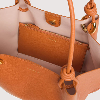 Руда італійська шкіряна жіноча сумка Coccinelle Finn Medium E1 U07 11 02 01 R41