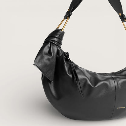 Чорна італійська шкіряна жіноча сумка Coccinelle Furoshiki Medium E1 U1A 13 02 01 001