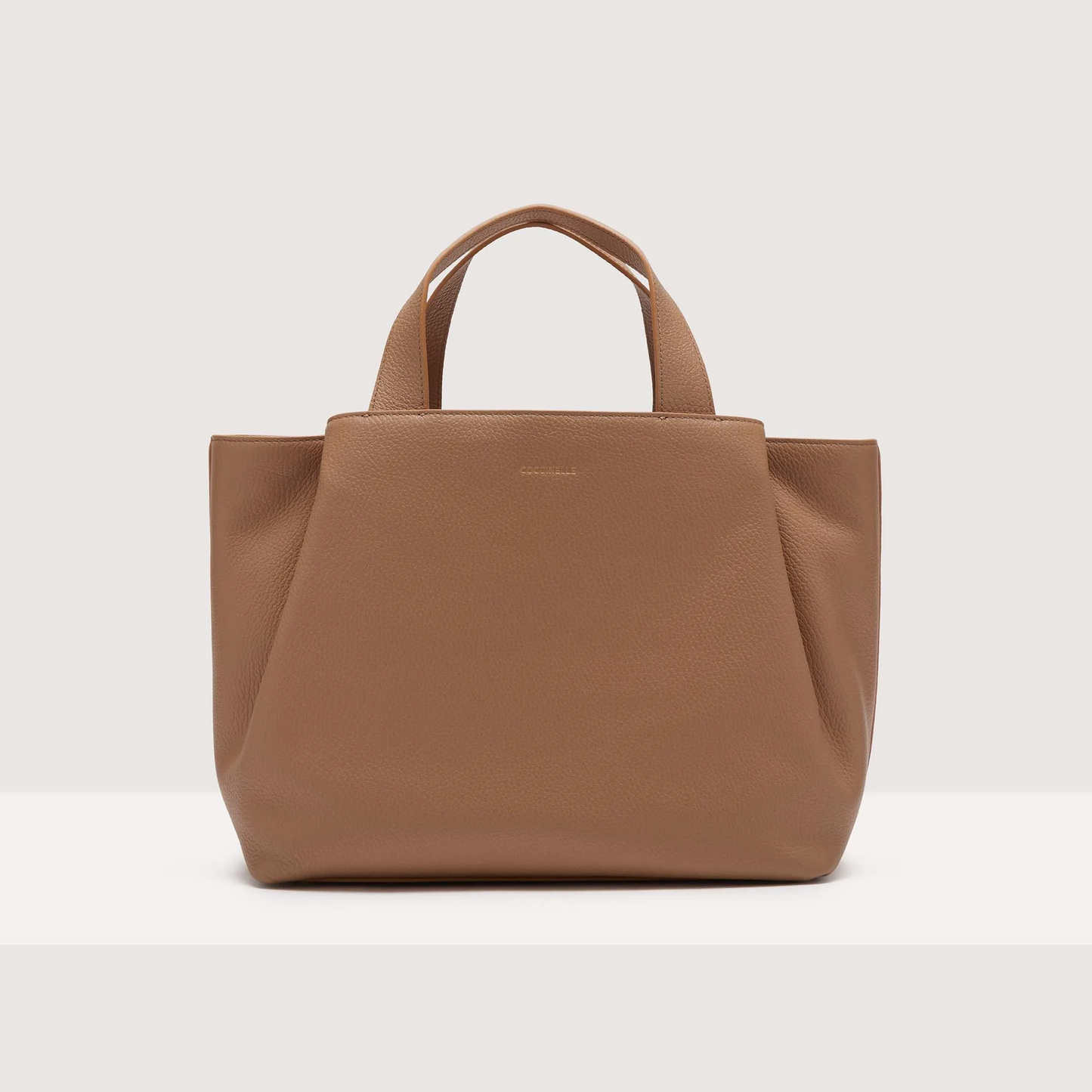 Бежева італійська шкіряна жіноча сумка Coccinelle Malory Medium E1 R1K 18 02 01 N71