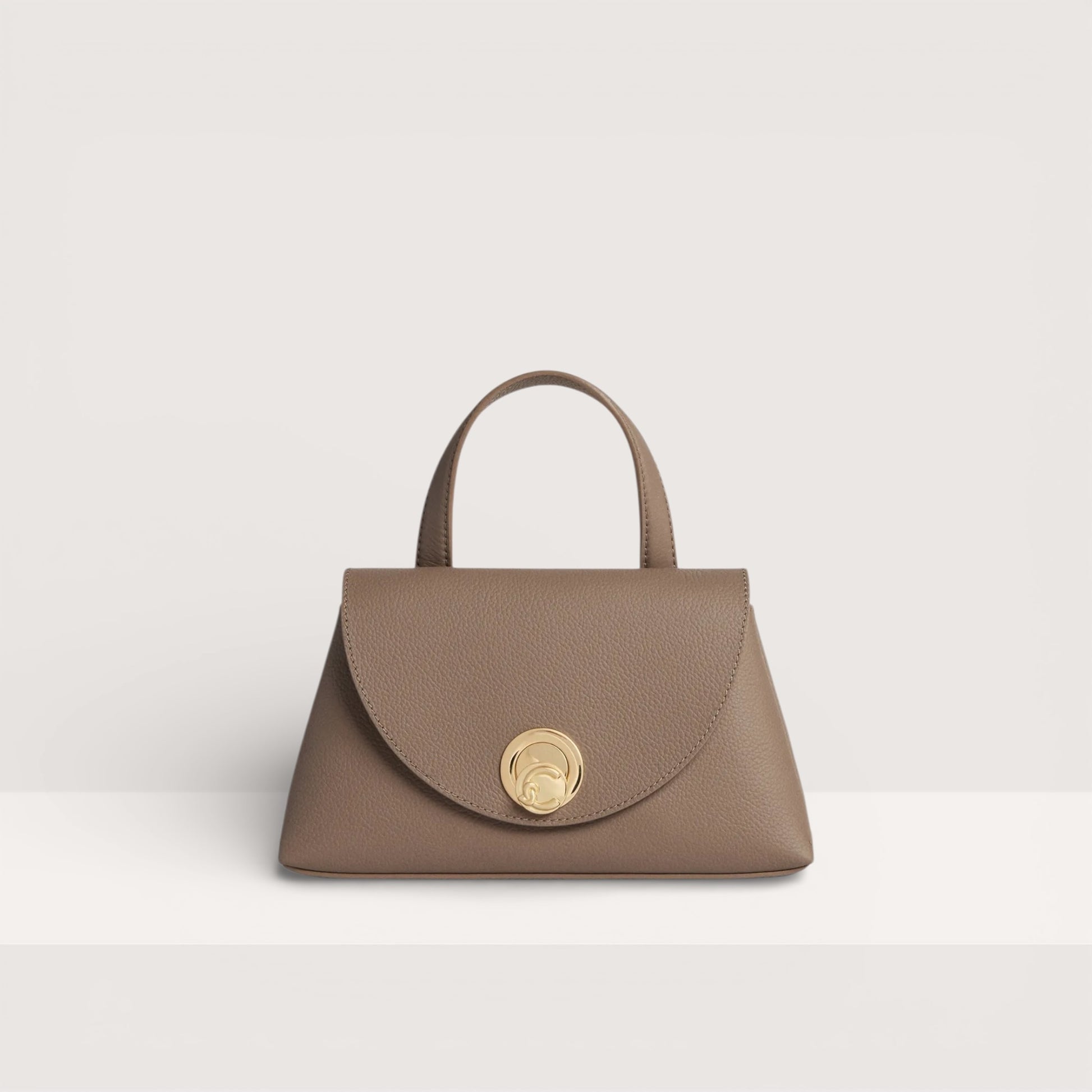 Італійська шкіряна жіноча сумка Coccinelle Nikla Small E1 TOA 18 02 01 352 кольору тауп