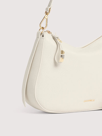 Біла італійська шкіряна жіноча сумка Coccinelle Nory Small E1 U45 13 02 01 N17