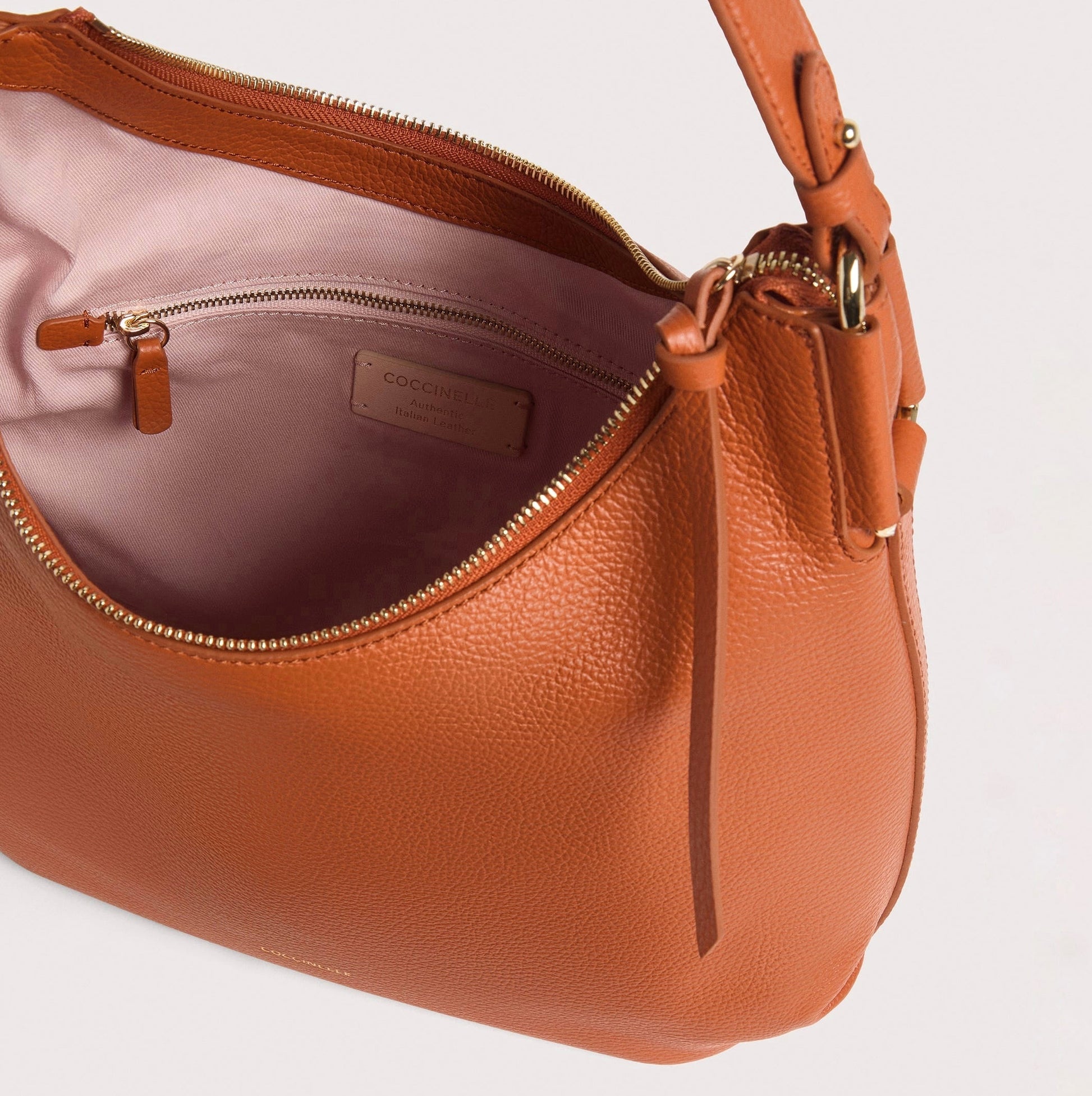 Руда італійська шкіряна жіноча сумка Coccinelle Rebekka Small E1 T95 13 02 01 R41