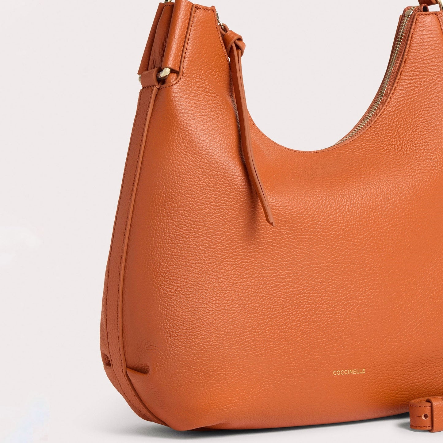 Руда італійська шкіряна жіноча сумка Coccinelle Rebekka Small E1 T95 13 02 01 R41