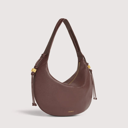Італійська шкіряна жіноча сумка Coccinelle Thess Medium E1 VCA 13 02 01 R49 кольору бургунді