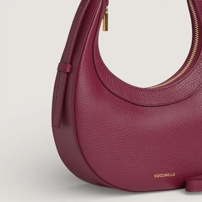 Бордова італійська шкіряна жіноча сумка Coccinelle Whisper E5 PIP 53 01 01 R52
