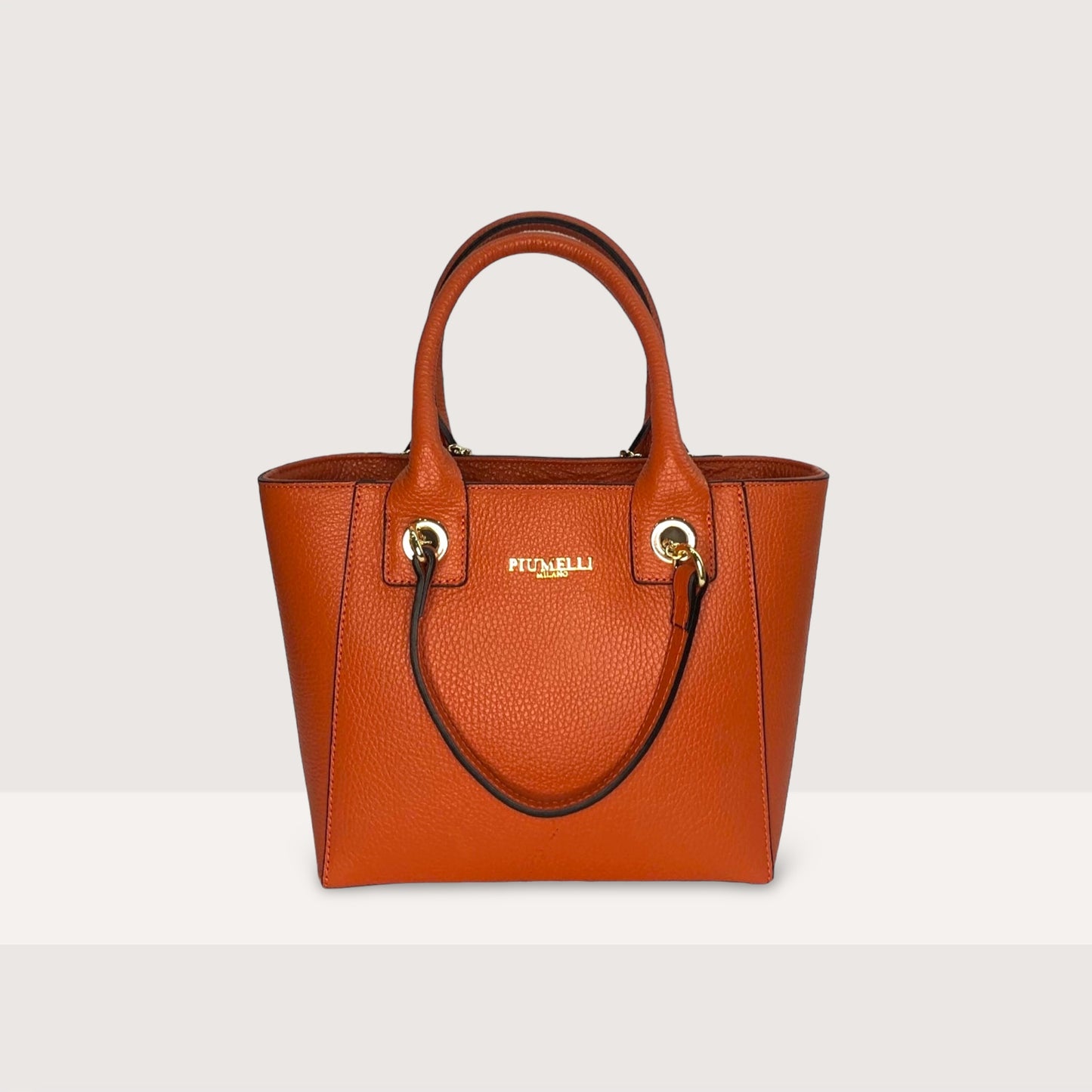 Помаранчева італійська шкіряна жіноча сумка Piumelli Clarissa letterine bag D35 Dark Orange