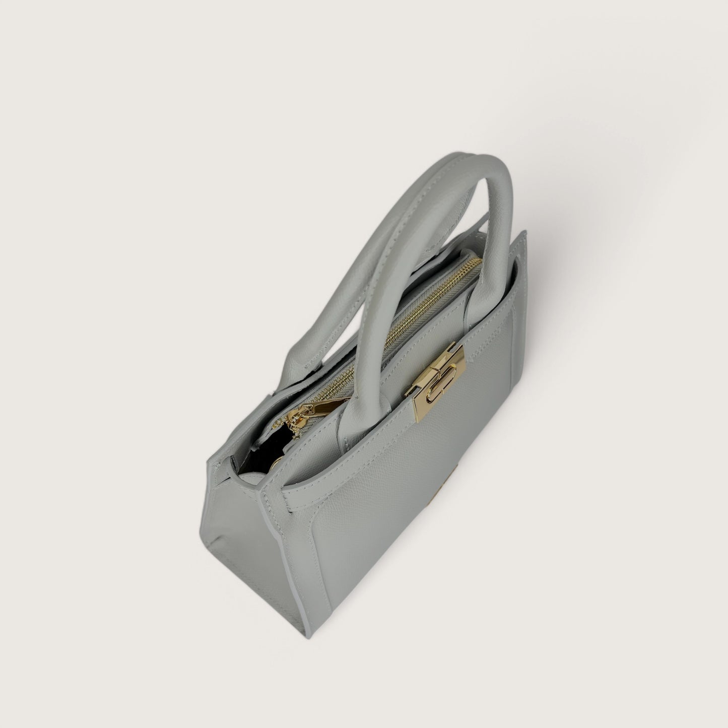 Сіра італійська жіноча сумка Piumelli Ira P630 Light Grey
