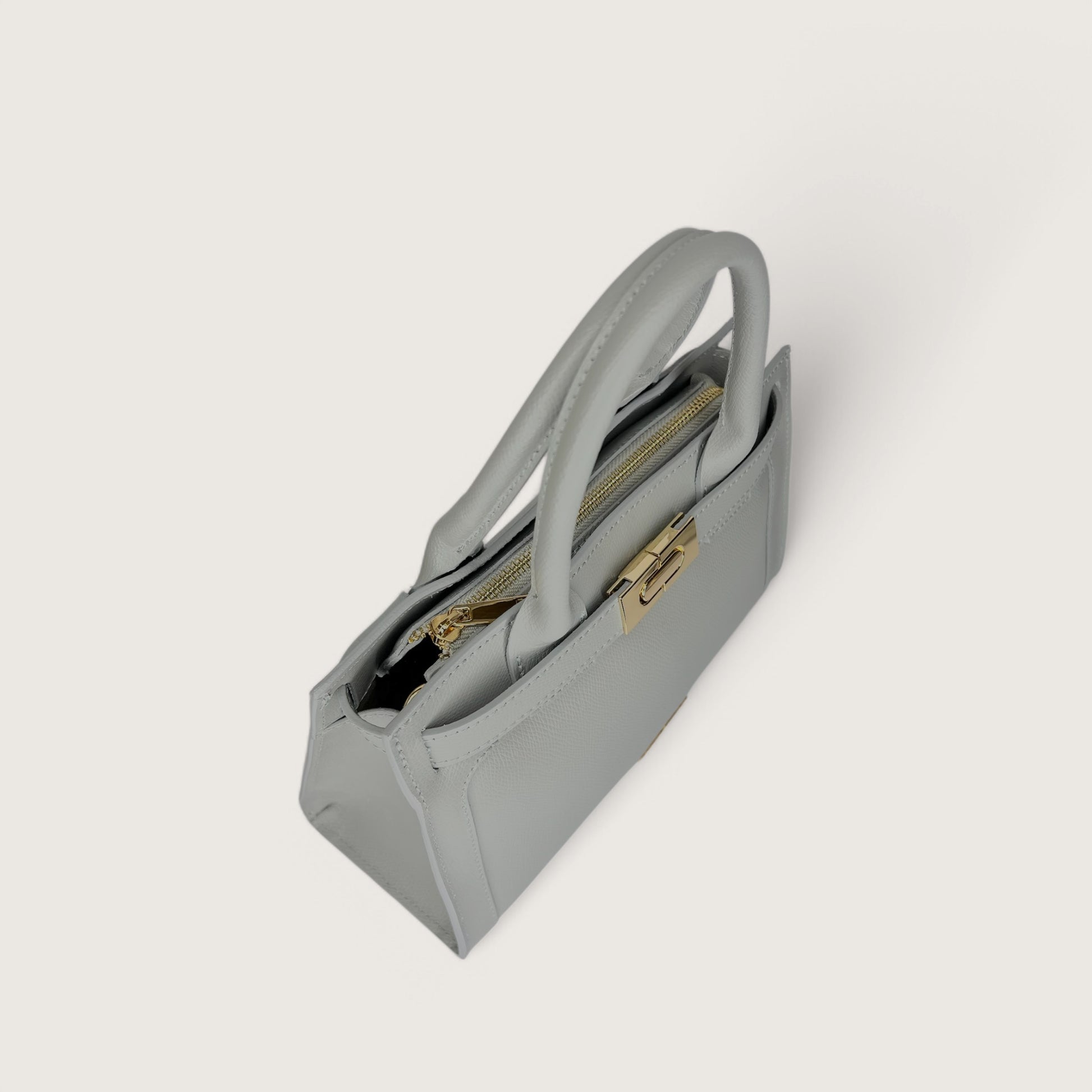 Сіра італійська жіноча сумка Piumelli Ira P630 Light Grey