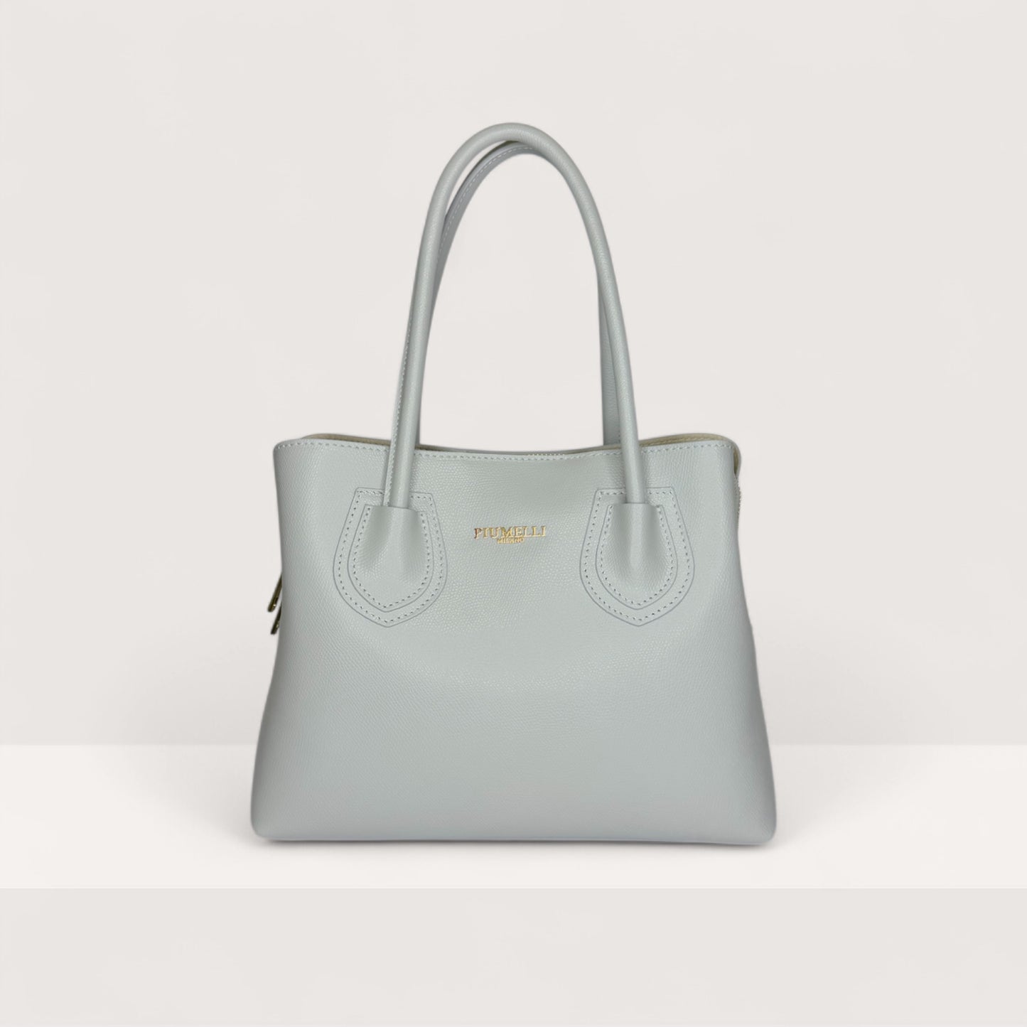 Сіра італійська шкіряна жіноча сумка Piumelli Iva М M P630 Light Grey