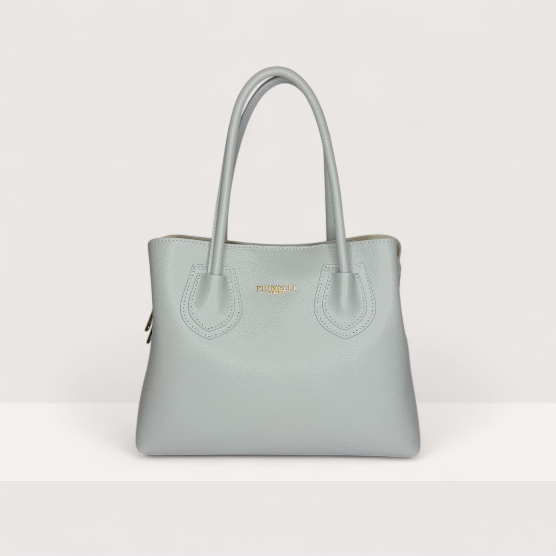 Сіра італійська шкіряна жіноча сумка Piumelli Iva М M P630 Light Grey