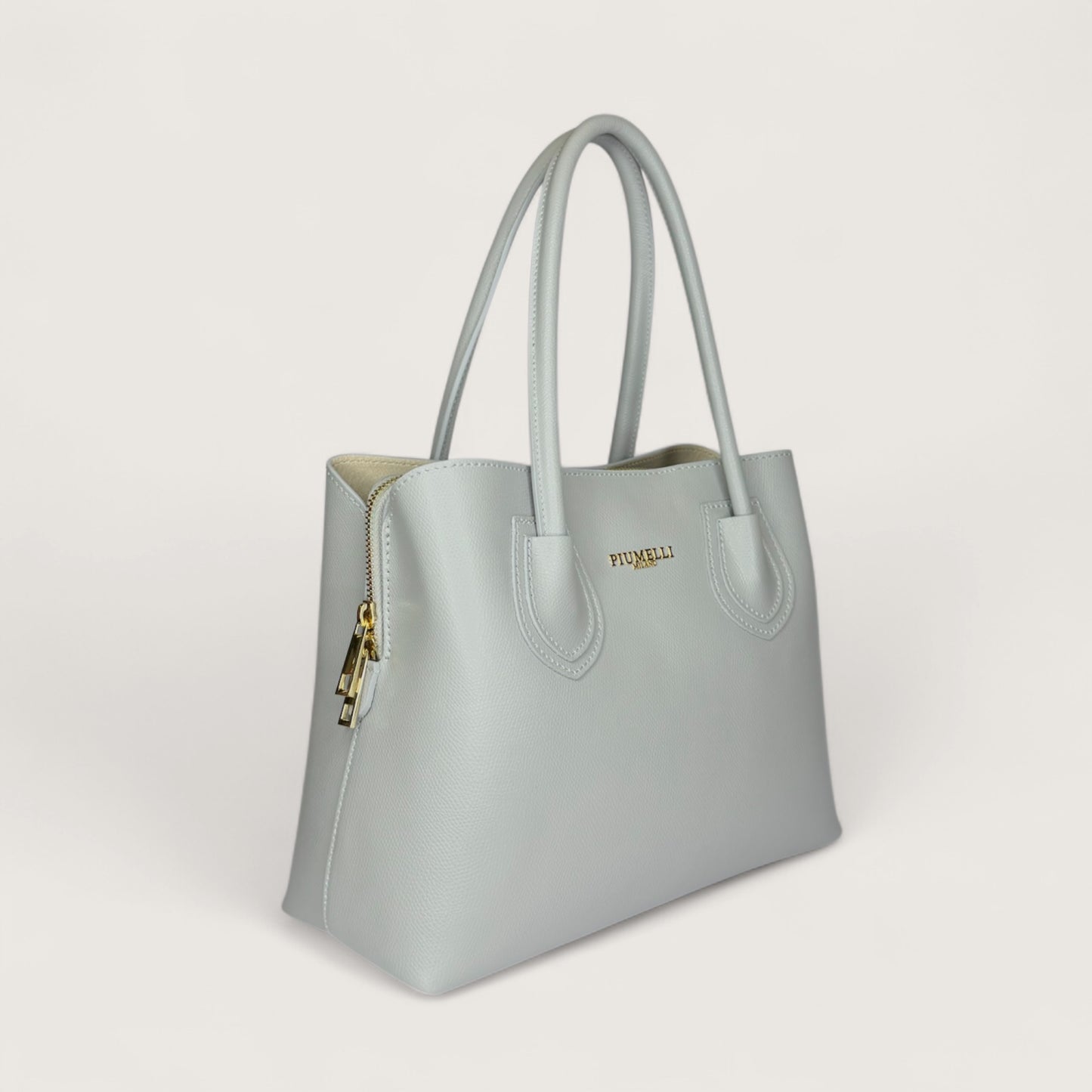 Сіра італійська шкіряна жіноча сумка Piumelli Iva М M P630 Light Grey
