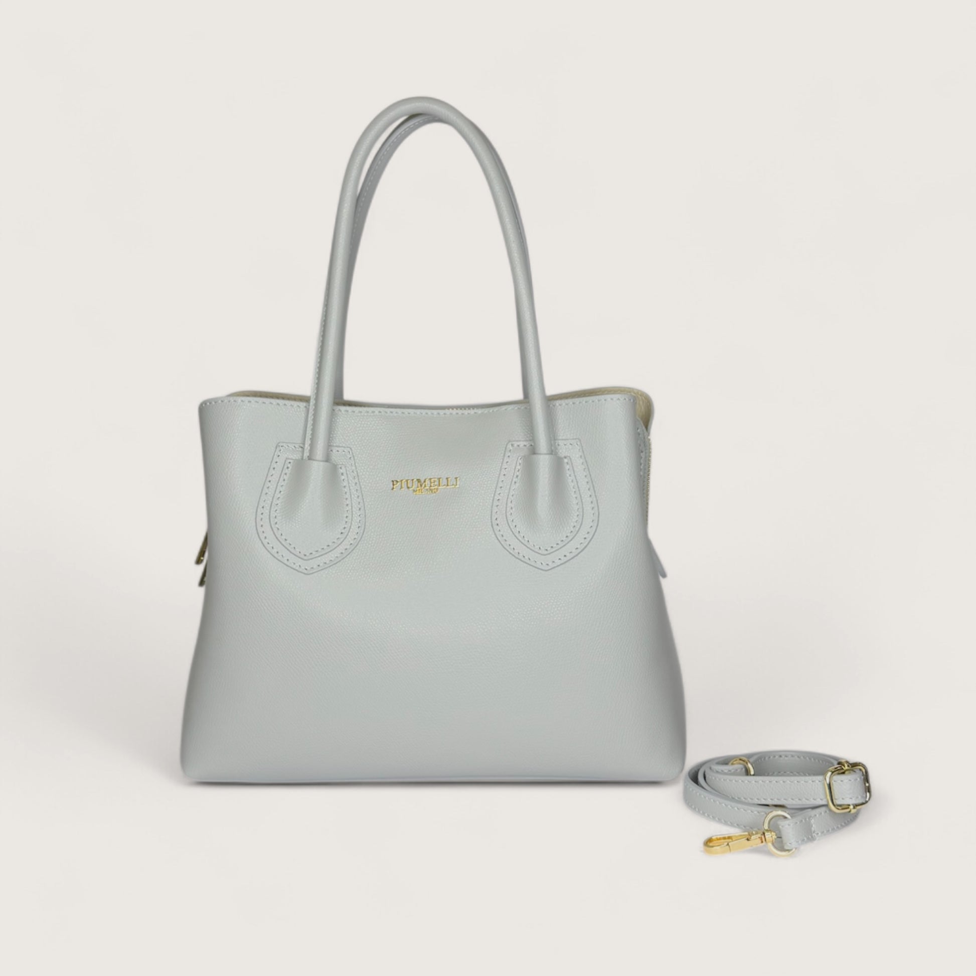 Сіра італійська шкіряна жіноча сумка Piumelli Iva М M P630 Light Grey