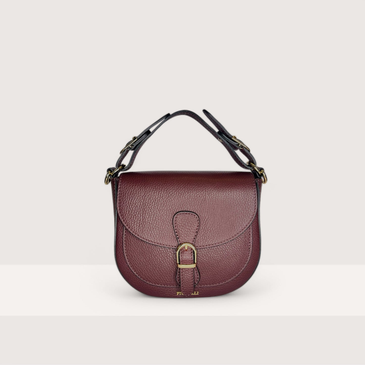 Італійська шкіряна жіноча сумка Piumelli Jole S D54 Burgundy кольору бургунді