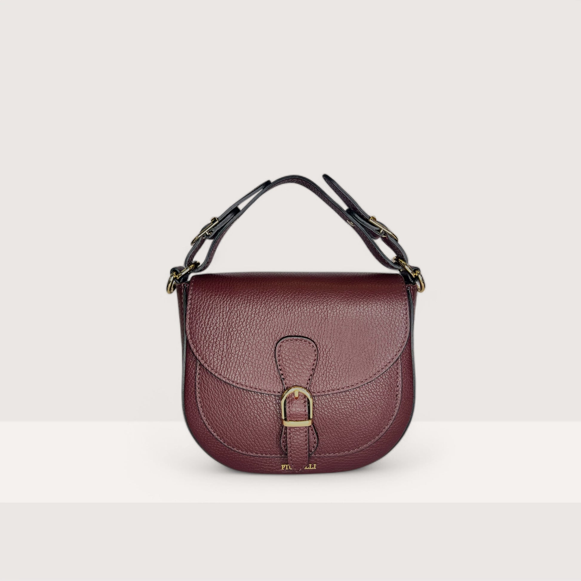 Італійська шкіряна жіноча сумка Piumelli Jole S D54 Burgundy кольору бургунді