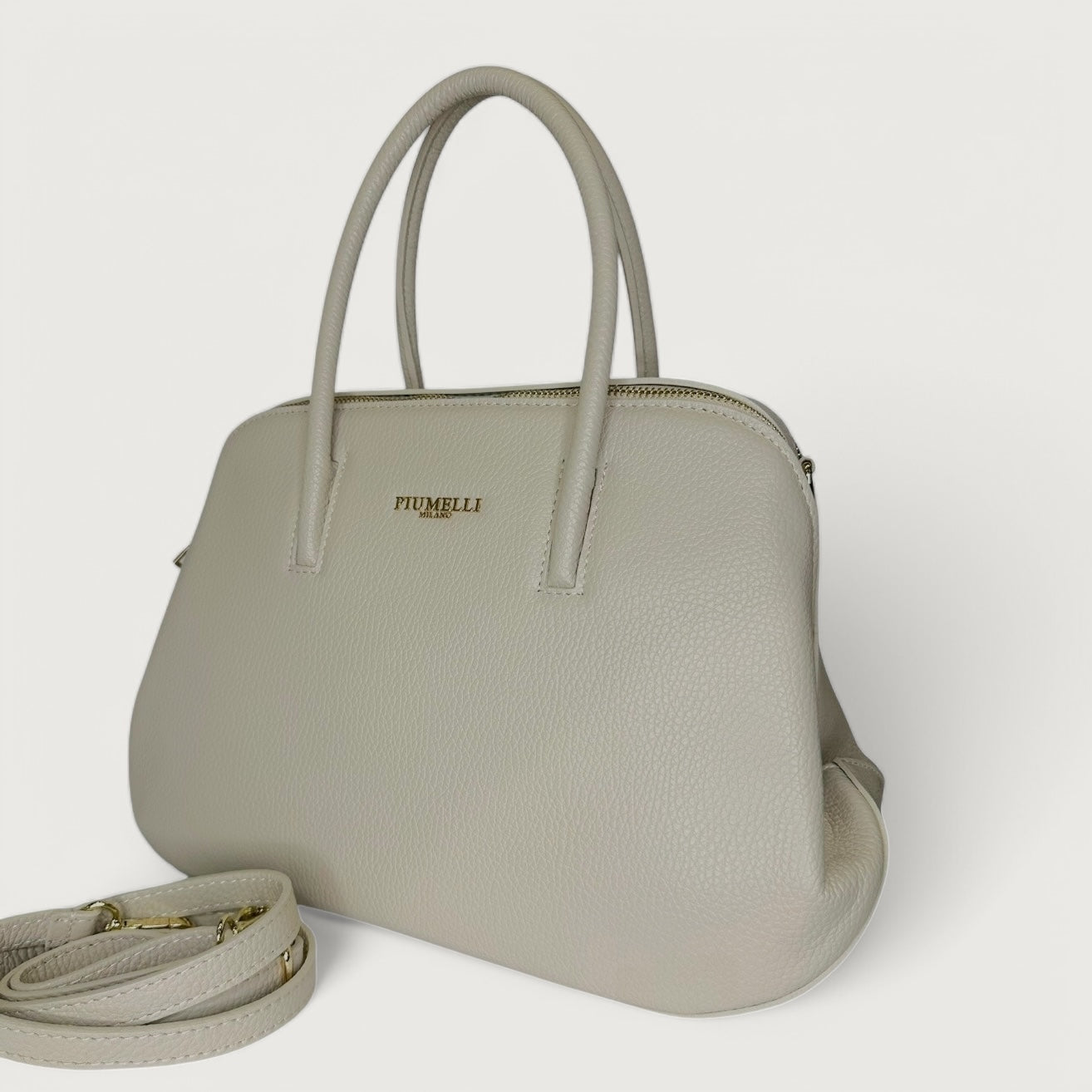 Біла італійська шкіряна жіноча сумка Piumelli Tara M D37 Off White